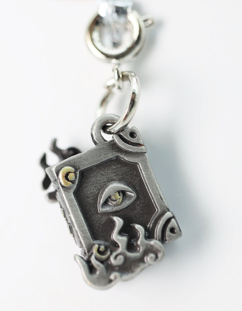 Traveler's Trinkets - Spellbook Charm